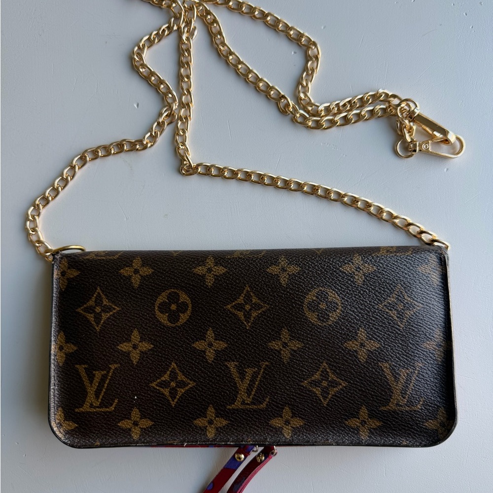 Louis Vuitton Sweet Monogram Clutch wallet.